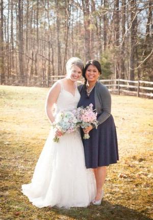 two women stand next to each other